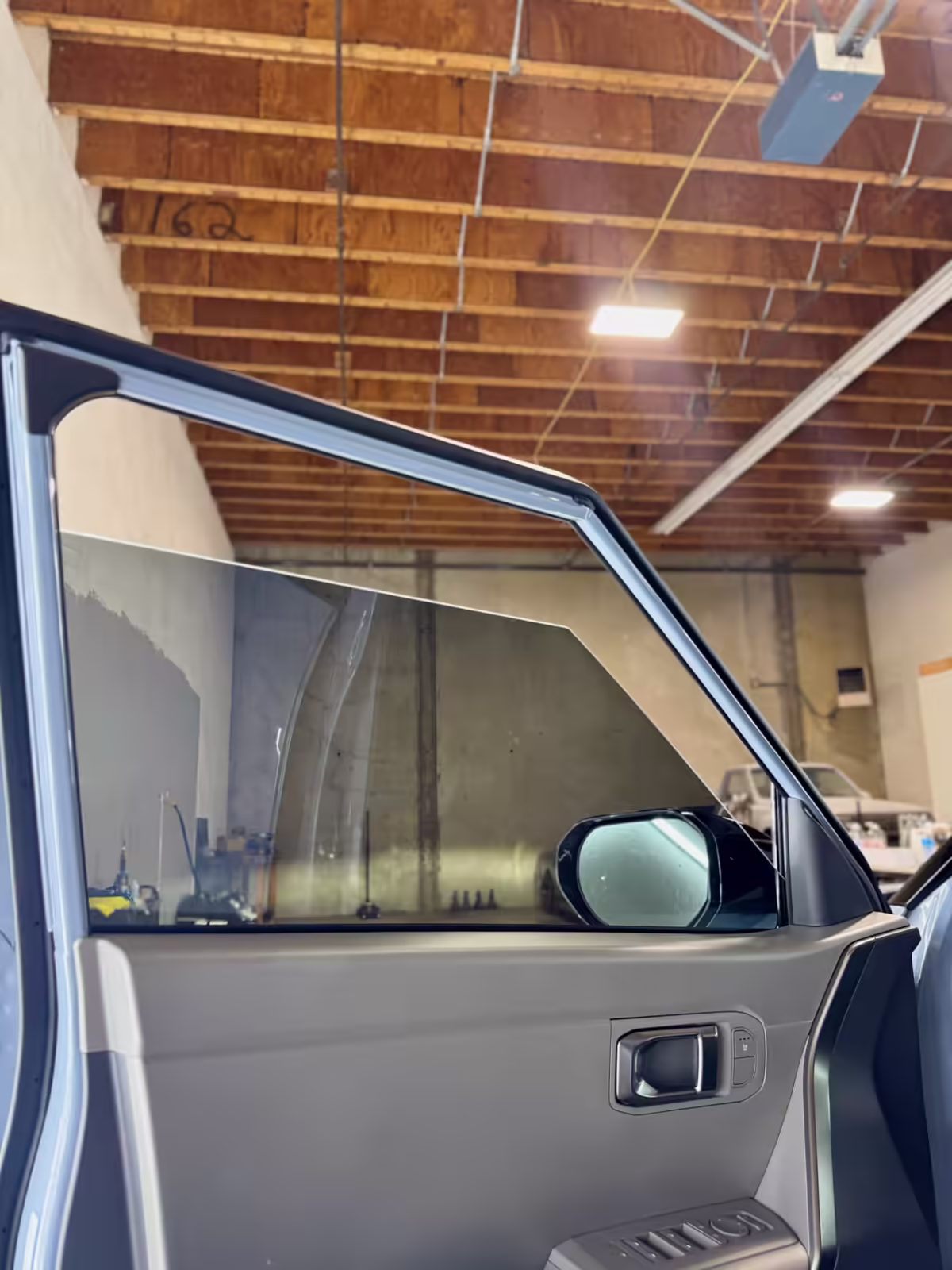 Window tint installation on a vehicle door